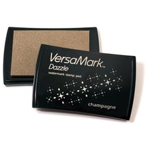 Charger l'image dans la galerie, Tsukineko - VersaMark Dazzle - Watermark Stamp Pad - Champagne. Dazzle combines all the great qualities of the original VersaMark with added shimmer to give your paper projects an easy touch of elegance. Available at Embellish Away located in Bowmanville Ontario Canada.
