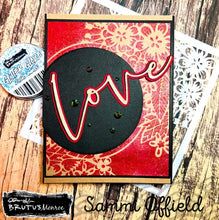 Load image into Gallery viewer, Brutus Monroe - Mixed Media Stencil - Floral Hoop. Made of a high quality plastic that will not wear down with use of a blending tool/sprays/inking. Designs can be used with large format pieces as well as small cards and the pattern will not be lost. Available at Embellish Away located in Bowmanville Ontario Canada. card made by Sammi Offield.
