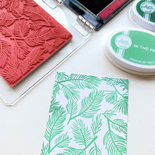 गैलरी व्यूवर में इमेज लोड करें, Catherine Pooler - Background Stamp - Pine Forest. Create a sweeping pine branch background on your winter card with the Pine Forest Background Stamp.  This stamp is ready to be inked up or embossed away! Background measures 4-3/8 x 5-5/8. Available at Embellish Away located in Bowmanville Ontario Canada.
