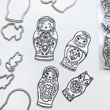 Cargar imagen en el visor de la galería, Catherine Pooler - Die Set - We Fit. Remind your friends and loved ones they "just fit" by sending cards made with the We Fit Dies and coordinating We Fit Stamps. Use the dies to cut out one of the three dolls, the cat doll or one of the extras. Layer the pieces to create dimension and fun on all your friendly cards. Available at Embellish Away located in Bowmanville Ontario Canada.
