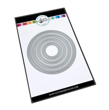 Load image into Gallery viewer, Catherine Pooler - Dies - Double Duty Circle. The Double Duty Circle Dies are the perfect touch for any hand made card for a layer or accented window. Includes 4 nesting sized dies do double duty, cutting both a dotted frame and dotted circle at once. Available at Embellish Away located in Bowmanville Ontario Canada.
