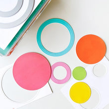 Load image into Gallery viewer, Catherine Pooler - Dies - Double Duty Circle. The Double Duty Circle Dies are the perfect touch for any hand made card for a layer or accented window. Includes 4 nesting sized dies do double duty, cutting both a dotted frame and dotted circle at once. Available at Embellish Away located in Bowmanville Ontario Canada.
