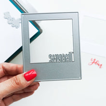 Cargar imagen en el visor de la galería, Catherine Pooler - Dies - Instant Thanks. Inspired by the classic Polaroid are the Instant Happy and Instant Thanks Dies. These versatile dies can be used in so many ways! With the secondary dies, you can cut the word out of the frame for another look. Illustrated by Leslie Dunegan. Stainless steel and are compatible with all standard die cutting machines. Available at Embellish Away located in Bowmanville Ontario Canada.
