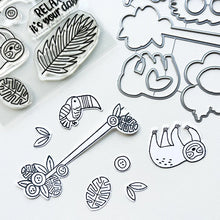 Charger l'image dans la galerie, Catherine Pooler - Stamp &amp; Die Set - Jungle Amigos. Send a jungle greeting to your friend and let them know "things are about to get wild"! The Jungle Amigos Set features a happy sloth and his toucan friend who are ready to hang out on your next card. Available at Embellish Away located in Bowmanville Ontario Canada.
