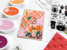 गैलरी व्यूवर में इमेज लोड करें, Catherine Pooler - Stamps and Dies Set - Pumpkin Season. Autumnal icons like hot beverage mugs and thermos, falling leaves, twigs, bowls and of course a layering pumpkin stamp. Use one of the nine (9) dies in the The Pumpkin Season Dies Set. Available at Embellish Away located in Bowmanville Ontario Canada. card design by brand ambassador.

