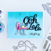 Cargar imagen en el visor de la galería, Catherine Pooler - Word Die - Ooh LaLa. Ooh Lala, this word die is divine!! The Ooh Lala is a cute addition to a card celebrating exciting news! It pairs perfectly with our Dreaming of France Stamp Set but will also be a cute focal point for a birthday or a fun way to say congrats.  Die measures approx. 2-1/2" x 3". Available at Embellish Away located in Bowmanville Ontario Canada. Card example by Catherine Pooler
