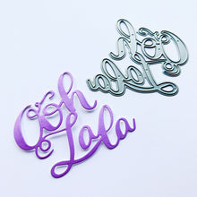 Cargar imagen en el visor de la galería, Catherine Pooler - Word Die - Ooh LaLa. Ooh Lala, this word die is divine!! The Ooh Lala is a cute addition to a card celebrating exciting news! It pairs perfectly with our Dreaming of France Stamp Set but will also be a cute focal point for a birthday or a fun way to say congrats.  Die measures approx. 2-1/2" x 3". Available at Embellish Away located in Bowmanville Ontario Canada.
