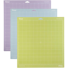 Charger l'image dans la galerie, Cricut - Adhesive Back Cutting Mats 12"X12" - 3/Pkg - Green, Blue &amp; Purple. Provo Craft-Cricut Adhesive Back Cutting Mats: Green, Blue And Purple. Each of the three mats has been customized to match the weight of commonly used crafting materials. Each has just the right level of grip to not only hold your material firmly in place during use but also allow you to easily remove the material from the adhesive surface. Available at Embellish Away located in Bowmanville Ontario Canada.
