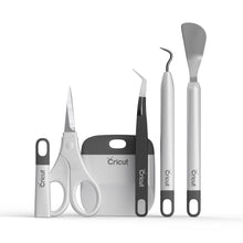 Load image into Gallery viewer, Cricut - Basic Tools Set - Gray. Craft in style with our Basic Tool Set in fresh, complementary hues. This 5-piece set gets you started with the basic tools you need for a Cricut® crafting session. You'll be equipped to precisely and expertly handle most DIY projects, from vinyl for decals to iron-on decor projects, to cardstock masterpieces - and that's just the beginning. It's an essential companion for all Cricut smart cutting machines. Available at Embellish Away located in Bowmanville Ontario Canada.

