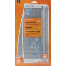 Load image into Gallery viewer, FISKARS-Euro Paper Trimmer. This trimmer features the triple track blade and rail system, a swing-out arm that extends the measuring deck to 15 inches, an ergonomic carriage for a better grip while cutting, and rubberized feet for stability. Available at Embellish Away located in Bowmanville Ontario Canada.
