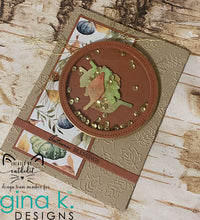 Cargar imagen en el visor de la galería, Gina K. Designs - Embossing Folder - Falling Leaves. The embossing folders create deeply etched designs for a truly dimensional effect. They can also be used for a verity of fun cardmaking techniques. Embossing folders measure 5 x 7 inches. Available at Embellish Away located in Bowmanville Ontario Canada. 
