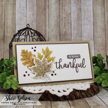 Load image into Gallery viewer, Gina K. Designs - Stamps - Layered Leaves. Layered Leaves is a stamp set by Hannah Drapinski. This set is made of premium clear photopolymer and measures 6" X 8". Made in the USA. Available at Embellish Away located in Bowmanville Ontario Canada. Card design by Shari Gilson.
