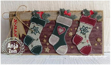Load image into Gallery viewer, Marianne Design - Craftables Die - Stocking. Craftable Die Stocking. Use this stocking die to create a beautiful stocking card which can be accented with the small snowflake and heart die. The sizes are: Stocking 1 x 3 Snowflake and Heart 1 x 1 in. Available at Embellish Away located in Bowmanville Ontario Canada. Card by brand ambassador.
