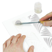 將圖片載入圖庫檢視器 Nuvo - Glimmer Paste - 1.7 oz. Nuvo Glimmer Paste can provide unique variety to your work. Use in combination with any stencil to create dimensional strip designs or bring texture and sparkle to larger areas and projects. The high concentration of glitter is sure to add a vibrant shimmer to whatever you are creating.  Available at Embellish Away located in Bowmanville Ontario Canada. Moonstone example
