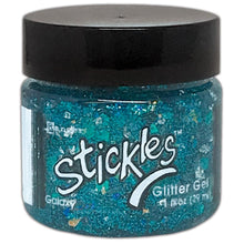 Charger l'image dans la galerie, Ranger - Stickles Glitter Gels - Select from dropdown. Stickles Glitter Gels are easily spreadable and work great applied through a stencil or directly to surface. Assorted sizes and shapes of glitter make crafts, mixed media and more truly sparkle! This package contains 1oz of glitter gel. Available at Embellish Away located in Bowmanville Ontario Canada. Galaxy.
