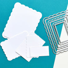 Load image into Gallery viewer, Catherine Pooler - Dies - Ruffles &amp; Dashes. We love our nested accent dies around here and you've asked for more sets. The Ruffles &amp; Dashes is a nesting set of wide ruffled scallop dies intermixed with rounded rectangle dies with dash embellishment. Available at Embellish Away located in Bowmanville Ontario Canada.
