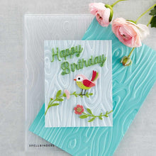 Cargar imagen en el visor de la galería, Spellbinders - 3D Embossing Folder - Knock On Wood. This has an intense wood grain designs. Texturize a surface of various card sizes from A2 to a Slimline. For detailed impression, lightly mist the cardstock on both sides with water before embossing. Available at Embellish Away located in Bowmanville Ontario Canada Card example by brand ambassador.

