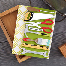 Cargar imagen en el visor de la galería, Spellbinders - Etched Dies By Nancy McCabe - Toolbox Essentials - All The Tools. This set includes 25 thin metal cutting dies. It indeed has all the tools from a hammer to a saw and even a ruler! Available at Embellish Away located in Bowmanville Ontario Canada. Example by brand ambassador.
