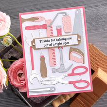 Cargar imagen en el visor de la galería, Spellbinders - Etched Dies By Nancy McCabe - Toolbox Essentials - All The Tools. This set includes 25 thin metal cutting dies. It indeed has all the tools from a hammer to a saw and even a ruler! Available at Embellish Away located in Bowmanville Ontario Canada. Example by brand ambassador.
