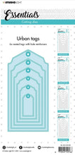 Load image into Gallery viewer, Studio Light - Cutting Die Urban Tag Essentials - 105x210x1mm 1 pc - nr.105. This set of cutting dies cuts 6 different sized nested tags and also includes hole reinforcers. These handy tags are a great addition to cards and scrapbook layouts.  Size: 4.1" x 8.3 inches. Available at Embellish Away located in Bowmanville Ontario Canada.
