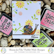 Cargar imagen en el visor de la galería, The Rabbit Hole Designs - 6x6 Stencil - Build your Garden. The Rabbit Hole Designs is proud to bring you our Made in the U.S.A 6x6 Stencils that will soon become an essential in your paper crafting and mixed media projects. You can paint, spray, mist, spritz, airbrush, sponge, doodle, mask, and so more! Try them out on card stock, canvas, cork, chipboard, acetate, and fabric. You are only limited by your imagination. Available at Embellish Away located in Bowmanville Ontario Canada. Card design by Deana.
