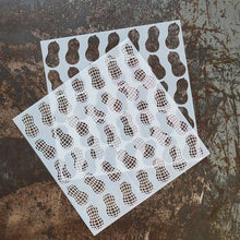 Charger l'image dans la galerie, The Rabbit Hole Designs - 6x6 Stencil 2 Layer's - Nutty. The Rabbit Hole Designs is proud to bring you our Made in the U.S.A 6x6 Stencils that will soon become an essential in your paper crafting and mixed media projects. 2 layers to create the perfect Peanut themed background. You can paint, spray, mist, spritz, airbrush, sponge, doodle, mask, and so more! Try them out on card stock, canvas, cork, chipboard, acetate, and fabric. Available at Embellish Away located in Bowmanville Ontario Canada.
