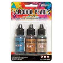Load image into Gallery viewer, Tim Holtz - Alcohol Ink Pearls Kits  - 3 per Pack - Select from Drop Down. Each Kit sold separately. Tim Holtz Alcohol Pearls are permanent, fast drying, pigment and dye inks formulated to create pearlescent colorful effects. Ideal for use on Alcohol Ink Yupo, as well as Alcohol Ink Cardstock, Foil Cardstock, Glossy Paper, and more. Apply Alcohol Pearls to metal, glass, and glazed tiles for limitless creative possibilities. WARNING: Flammable, irritant, vapor harmful.
