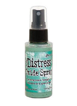 將圖片載入圖庫檢視器 Tim Holtz - Distress Oxide Spray. Creates oxidized effects when sprayed with water. Use for quick and easy ink coverage on porous surfaces. Spray through stencils, layer colors, spritz with water and watch the color mix and blend.  Available at Embellish Away located in Bowmanville Ontario Canada. Evergreen Bough
