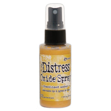 將圖片載入圖庫檢視器 Tim Holtz - Distress Oxide Spray. Creates oxidized effects when sprayed with water. Use for quick and easy ink coverage on porous surfaces. Spray through stencils, layer colors, spritz with water and watch the color mix and blend.  Available at Embellish Away located in Bowmanville Ontario Canada. Fossilized Amber
