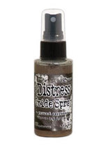將圖片載入圖庫檢視器 Tim Holtz - Distress Oxide Spray. Creates oxidized effects when sprayed with water. Use for quick and easy ink coverage on porous surfaces. Spray through stencils, layer colors, spritz with water and watch the color mix and blend.  Available at Embellish Away located in Bowmanville Ontario Canada. Ground Espresso

