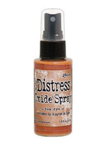 將圖片載入圖庫檢視器 Tim Holtz - Distress Oxide Spray. Creates oxidized effects when sprayed with water. Use for quick and easy ink coverage on porous surfaces. Spray through stencils, layer colors, spritz with water and watch the color mix and blend.  Available at Embellish Away located in Bowmanville Ontario Canada. Tea Dye
