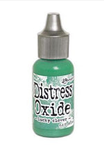 Charger l'image dans la galerie, Tim Holtz-Ranger Distress Oxides Reinkers. This water-reactive dye and pigment ink fusion creates an oxidized effect when sprayed with water. Use to re-ink Distress Oxide Ink Pads (sold separately). Available at Embellish Away located in Bowmanville Ontario Canada. Lucky Clover
