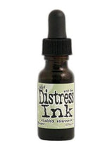 Charger l'image dans la galerie, Tim Holtz - Distress  Reinker. Create an aged look on papers, fibers, photos and more! This package contains one 0.5oz bottle of distress ink. Acid free. Conforms to ASTM D4236. Comes in a variety of colors. Each sold separately. Available at Embellish Away located in Bowmanville Ontario. Shabby Shutters
