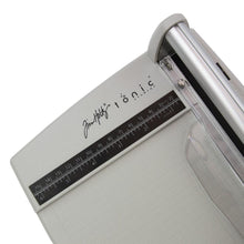 Load image into Gallery viewer, Tim Holtz - Rotary Media Trimmer. Featuring a geared rotary cutting blade, this trimmer effortlessly cuts through a range of crafting mediums. Available at Embellish Away located in Bowmanville Ontario Canada.
