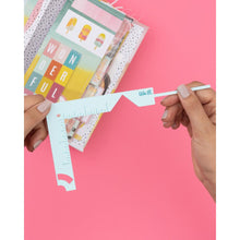Cargar imagen en el visor de la galería, We R Memory - Book Cover Guide - Mint. Perfect book board placement, consistent gaps, trim corners at the proper angle, easily round corners and mark spot for elastic closure. It also includes a scan code for detailed instructions. Available at Embellish Away located in Bowmanville Ontario Canada.
